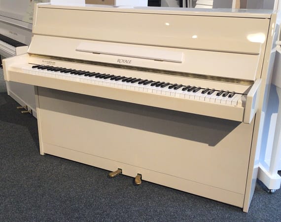 weißes gebrauchtes Klavier